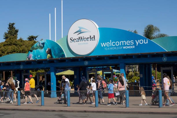 San Diego, CA, USA - Mar 24, 2022: The entrance to SeaWorld in San Diego, California. SeaWorld is an American theme park chain that owns and operates twelve recreational destinations in the United States, including seven theme parks and five water parks.