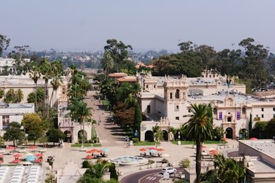 a view of a city with palm trees and buildings at Balboa Park San Diego